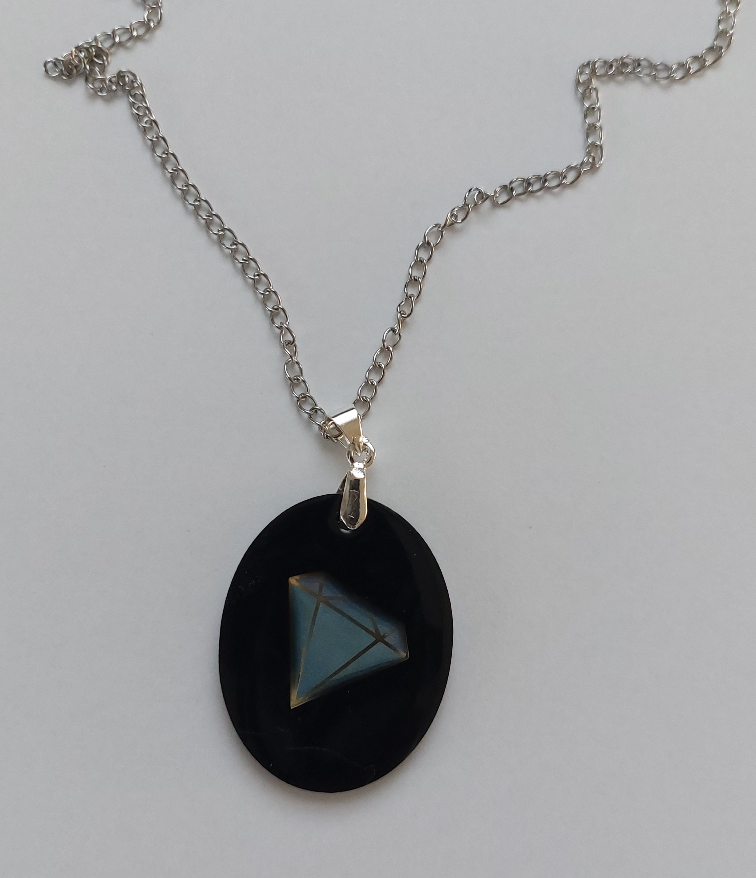 Ovalen zwarte hanger