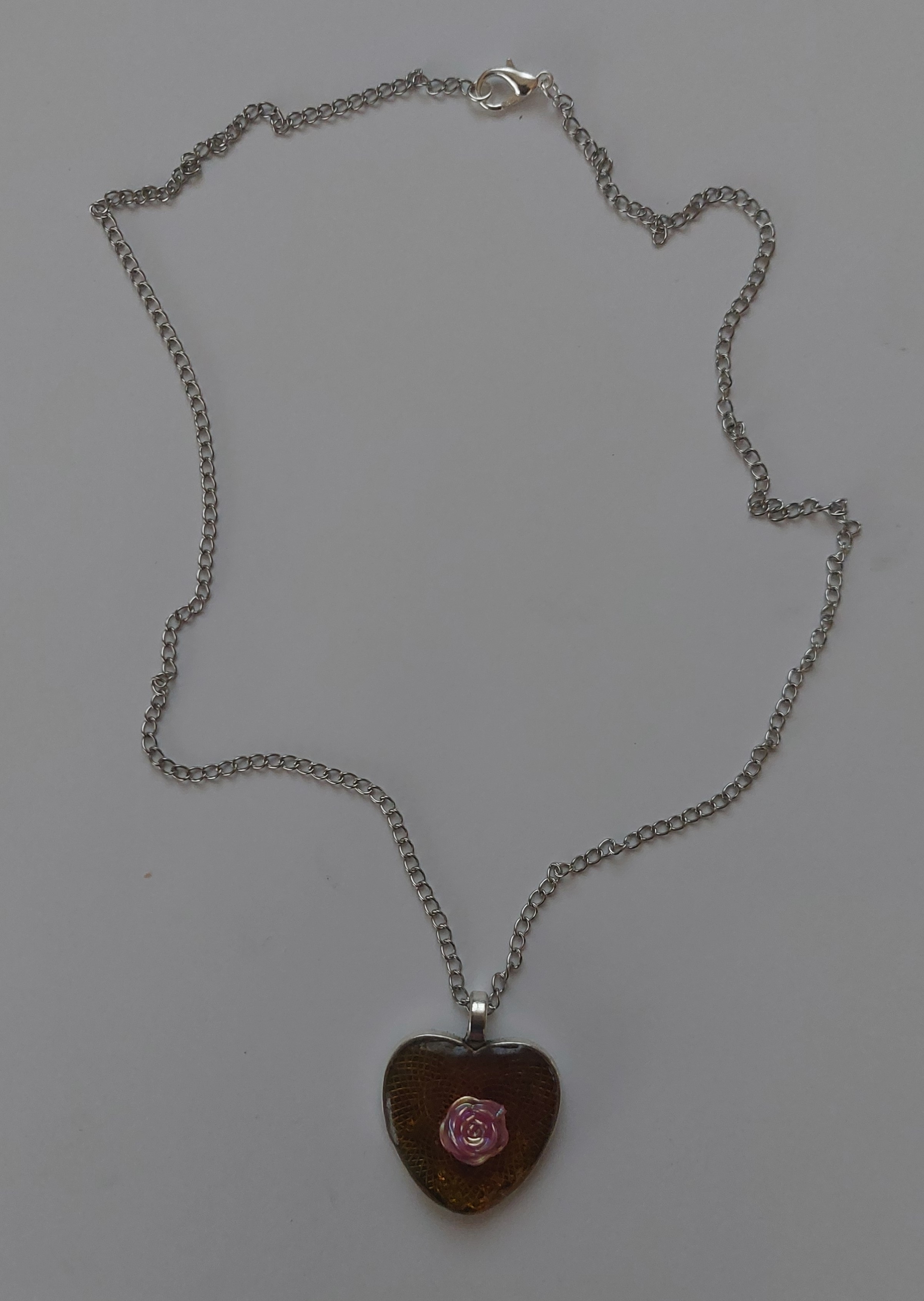 Roos in hart ketting