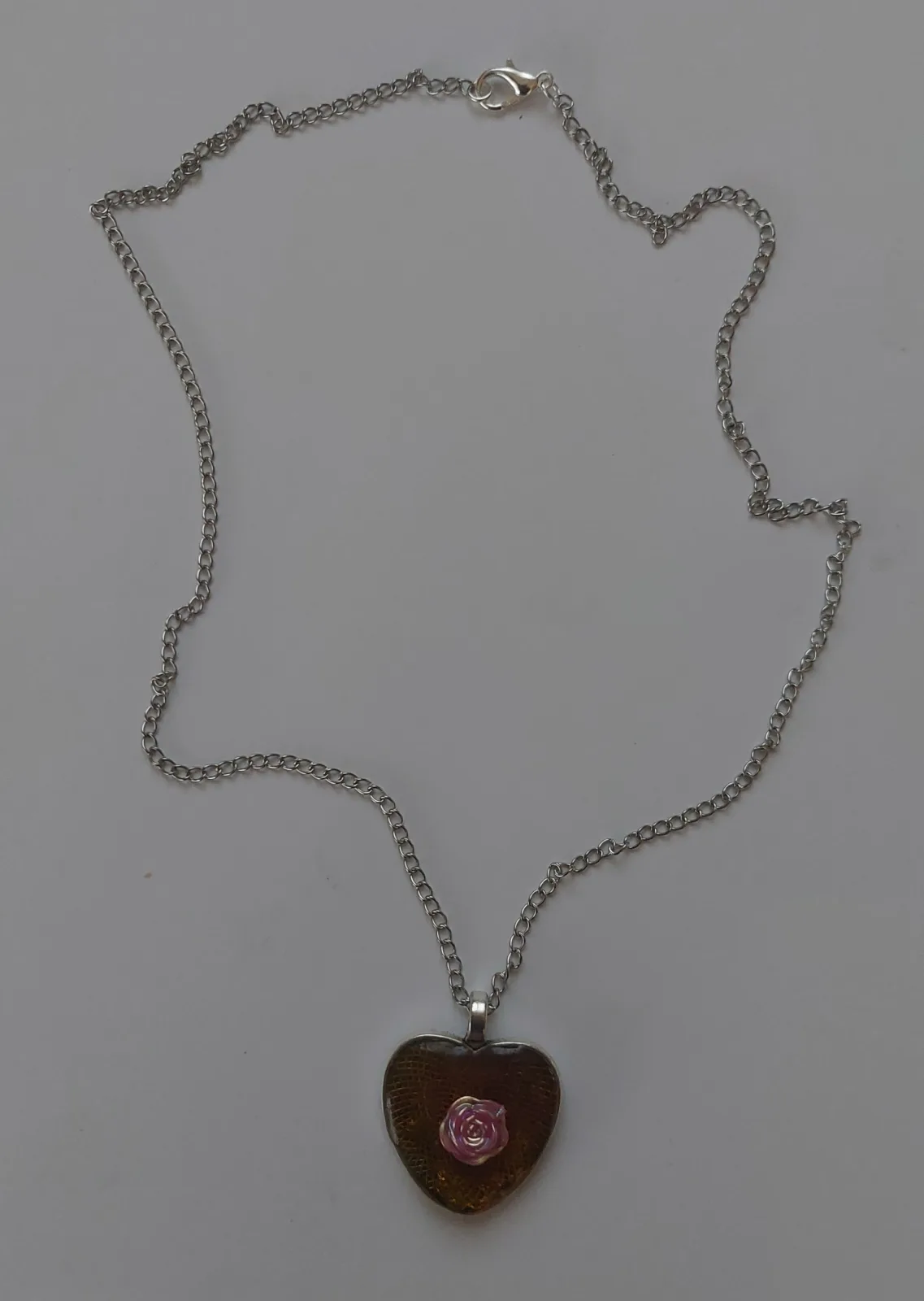 Roos in hart ketting