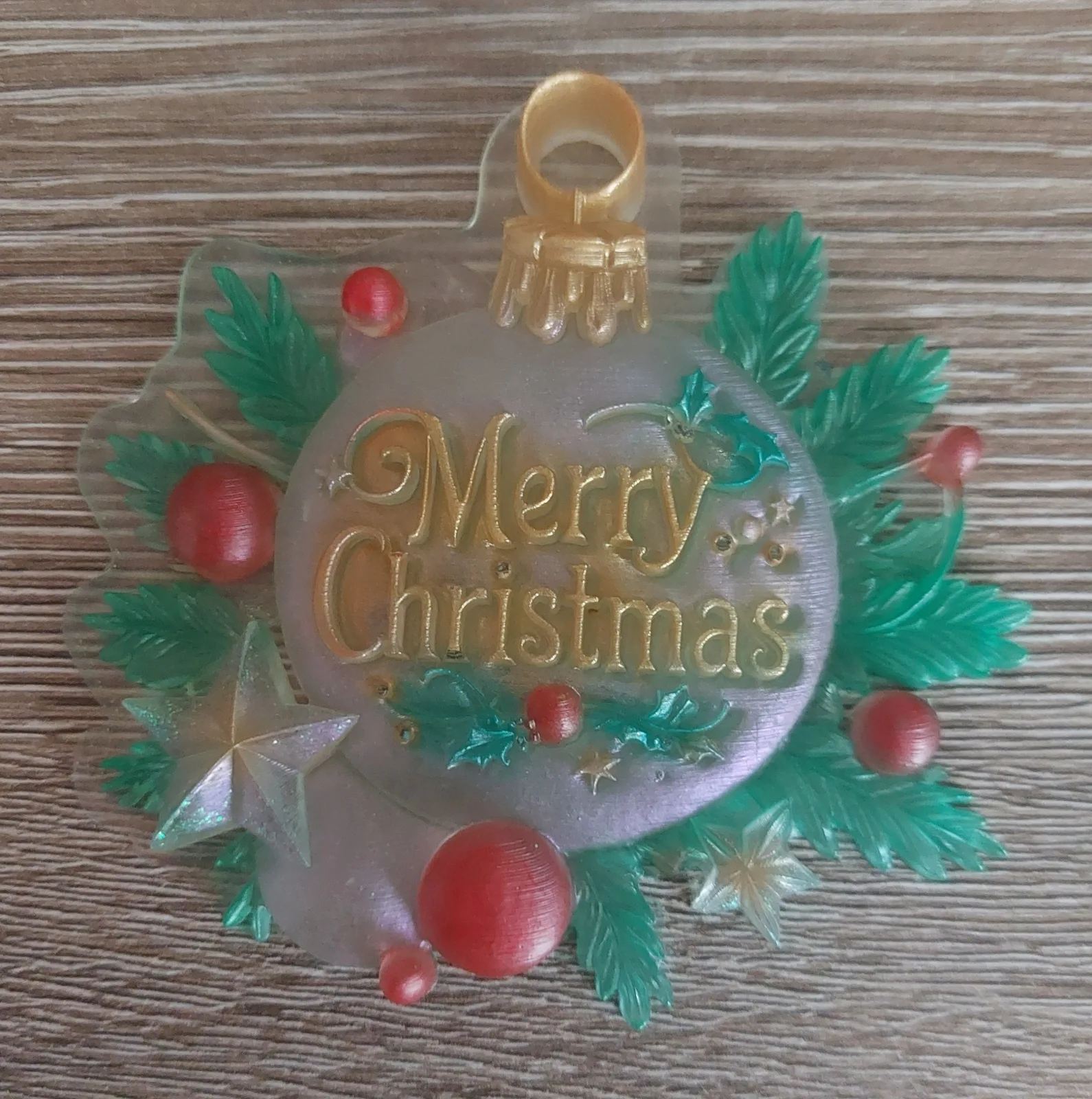 Gouden kerstbal met wens