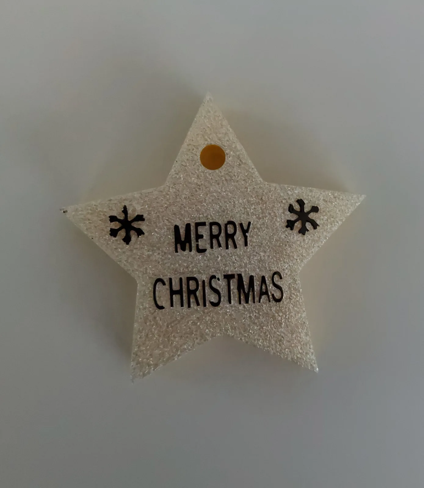 Kerstster hanger